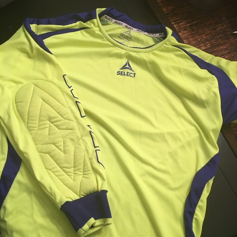 Two soccer jerseys and one matching athletic short